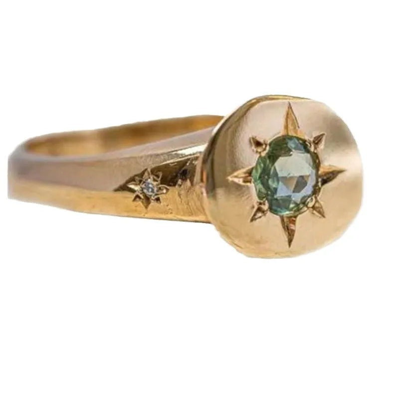 Golden colour oval ring with adjustable opening and star-shaped micro inlay design on zinc alloy band