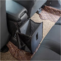 Black Oxford cloth car hanging trash can with hanging loops, shown unfolded.