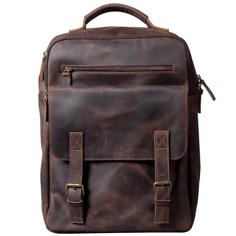 Dark coffee coloured handmade leather backpack with internal computer and mobile phone pockets.