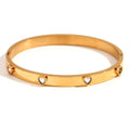 Stainless steel bracelet with a micro-inlaid peach heart charm in a choice of green or white diamond colour.