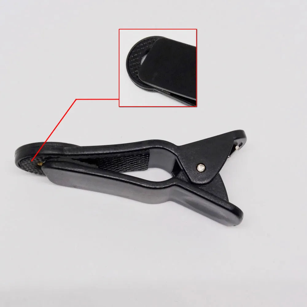 12x telescopic lens attached to mobile phone showing extended and collapsed positions with universal collar clip
