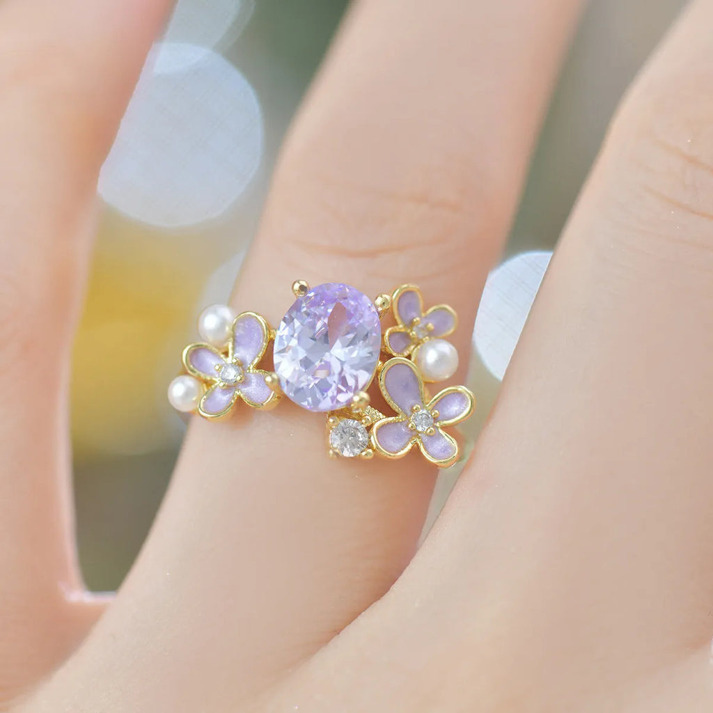 Women's open ring with flower pearl design and zircon details in yellow colour