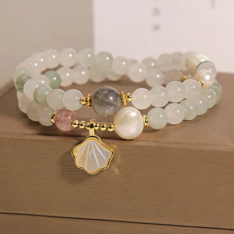 Crystal bracelet with Tianshan jade shell ginkgo leaf pendant and gold-plated gemstone settings
