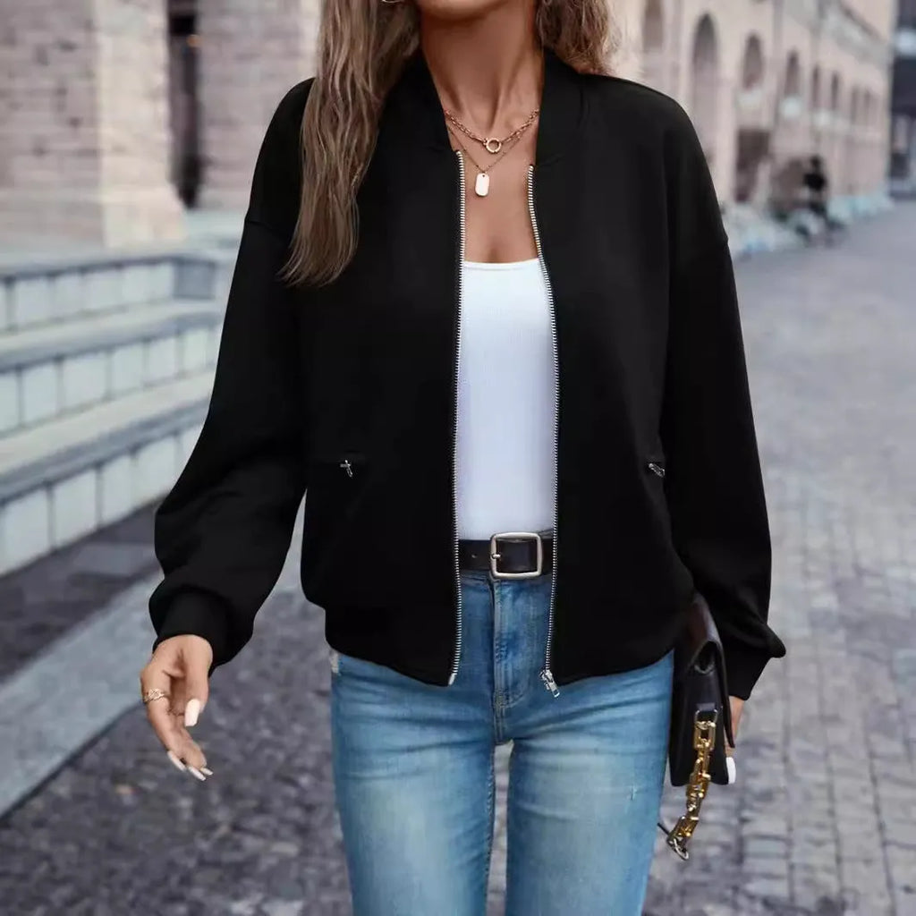 Black polyester zip jacket with long sleeves and faux pockets for women, sized S to XXL.