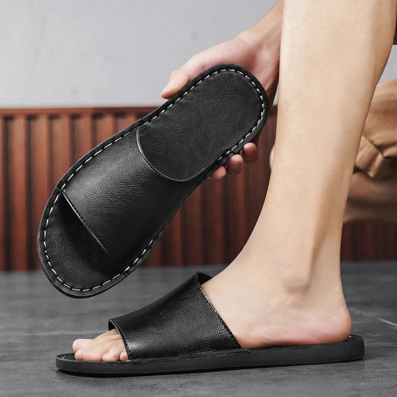 Men's brown leather sandals with rubber soles showing casual outdoor design