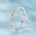 Silver Moss Password I Love You ring with oxidised black finish on a simple bracelet band.