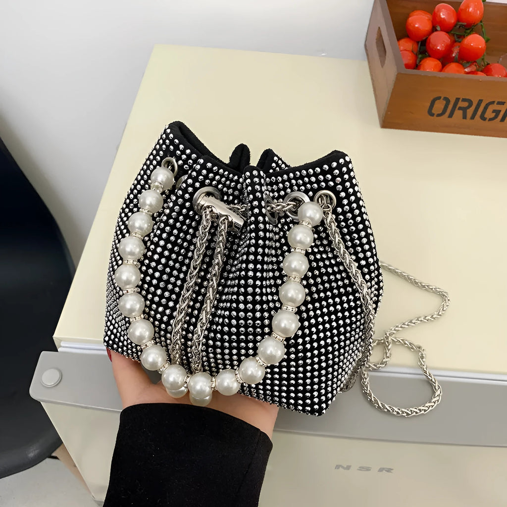 Light diamond shoulder crossbody bag with chain strap and bucket shape in soft PU.