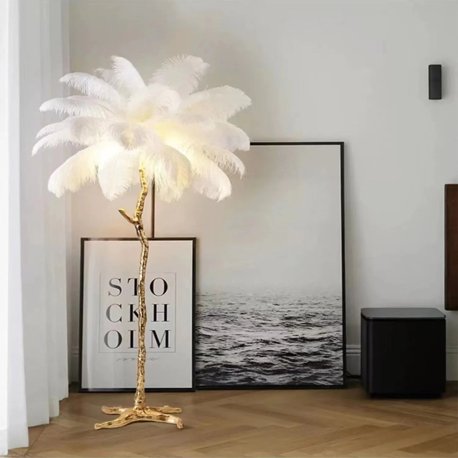 Decorative resin feather floor lamp standing 170cm tall with 32 individual feathers in choice of colours