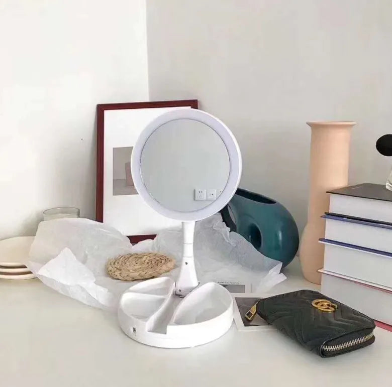 White acrylic double-sided LED vanity mirror with 360-degree rotation and USB charging cable