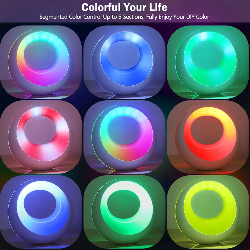Small RGB colour changing night lamp with remote control on wooden desk