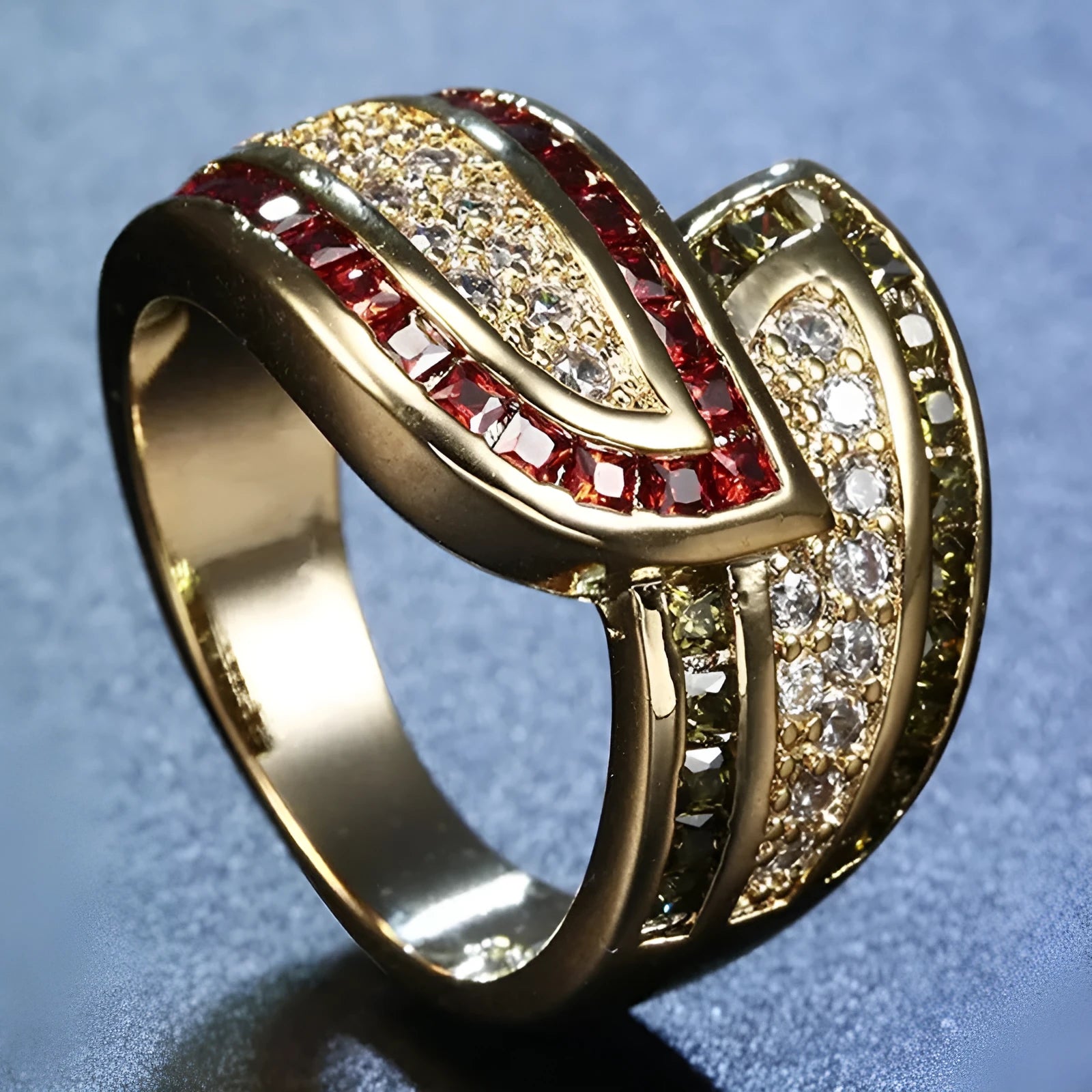 Gold-coloured women's alloy ring with a central green peridot stone on a model's finger.