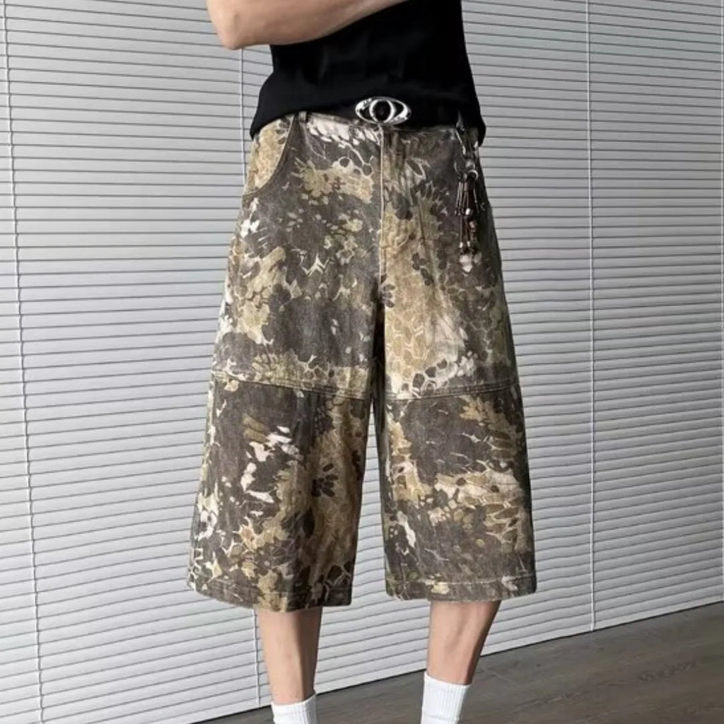 Yellow snake pattern camouflage cropped denim jeans on size chart showing S to 3XL options