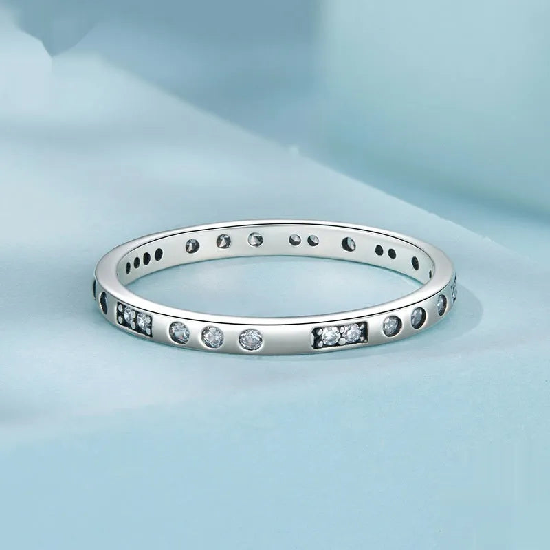 Silver Moss Password I Love You ring with oxidised black finish on a simple bracelet band.