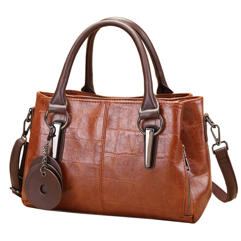 Large capacity shoulder bag with urban simplicity style, showing internal zipper compartments and contrasting sewing thread details