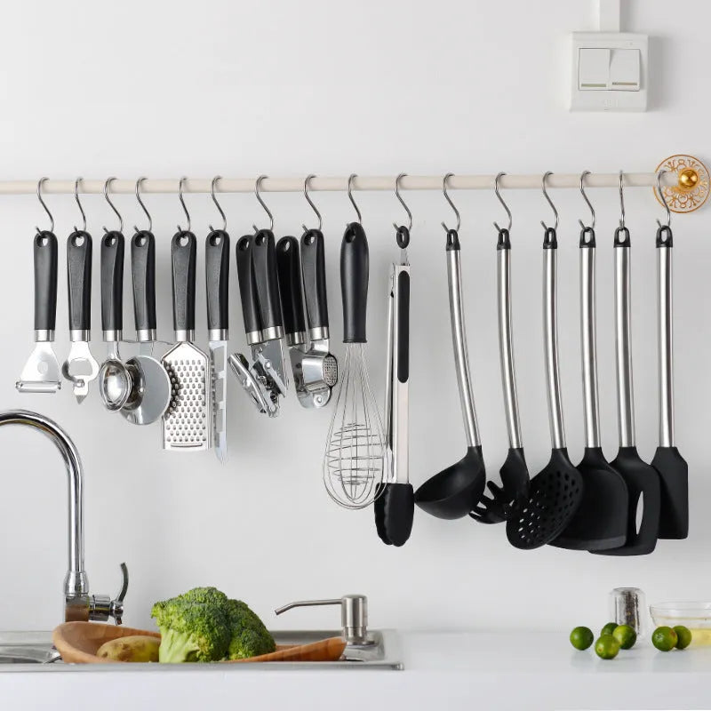 Black silicone and stainless steel 16-piece kitchen spatula and spoon set.
