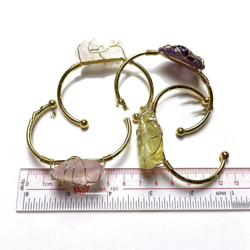 Natural crystal rough stone bracelet with geometric unshaped design and gold winding metal accents