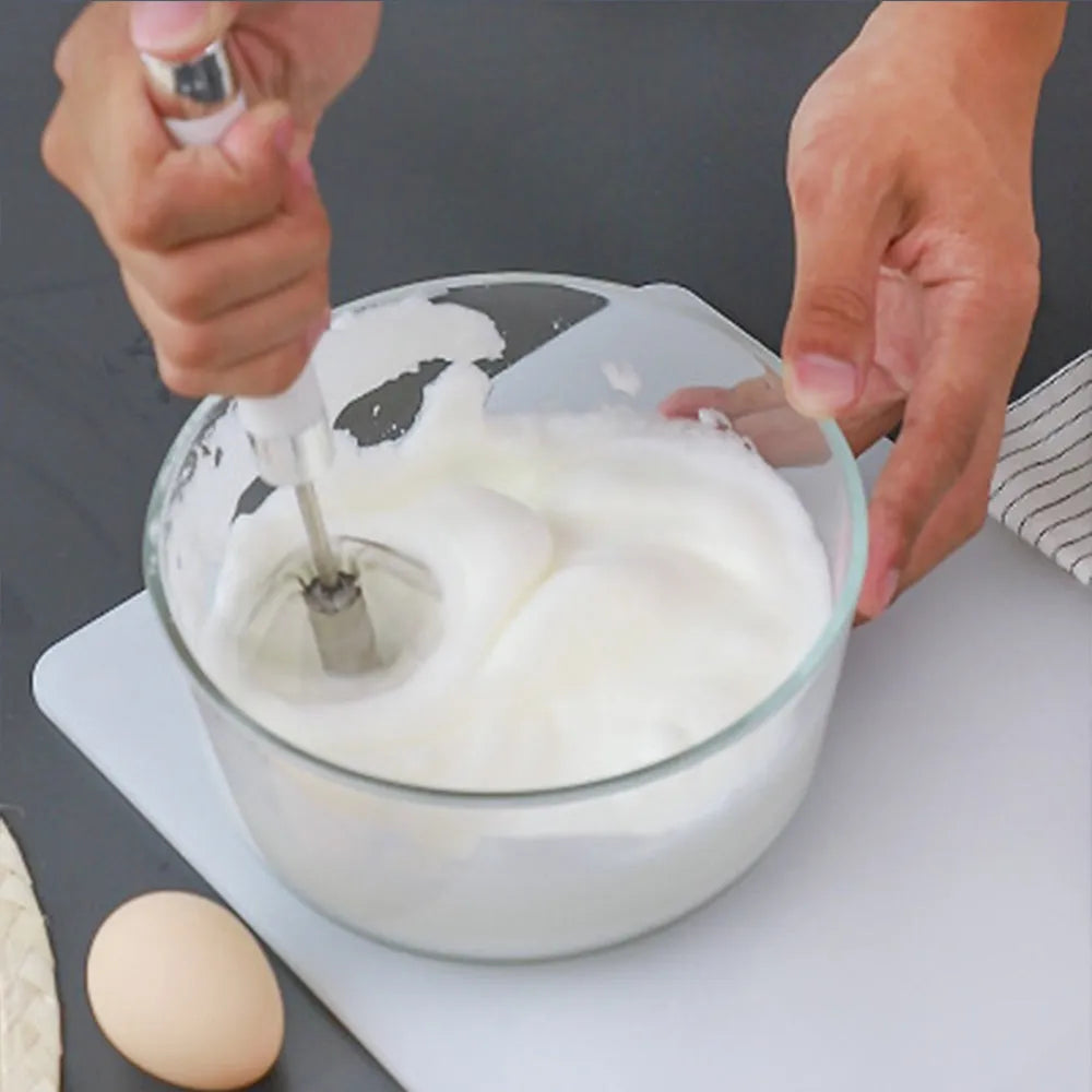 Semi-automatic stainless steel egg beater whisk with hand pressure rotating mechanism in silvery or white colour