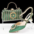 Women's black high-heel shoes with decorative ankle chain featuring floral rhinestone accents and matching clutch bag