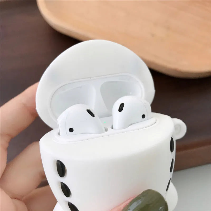 Cartoon airplane headset design silicone protective case for Apple AirPods with a carrying hook.