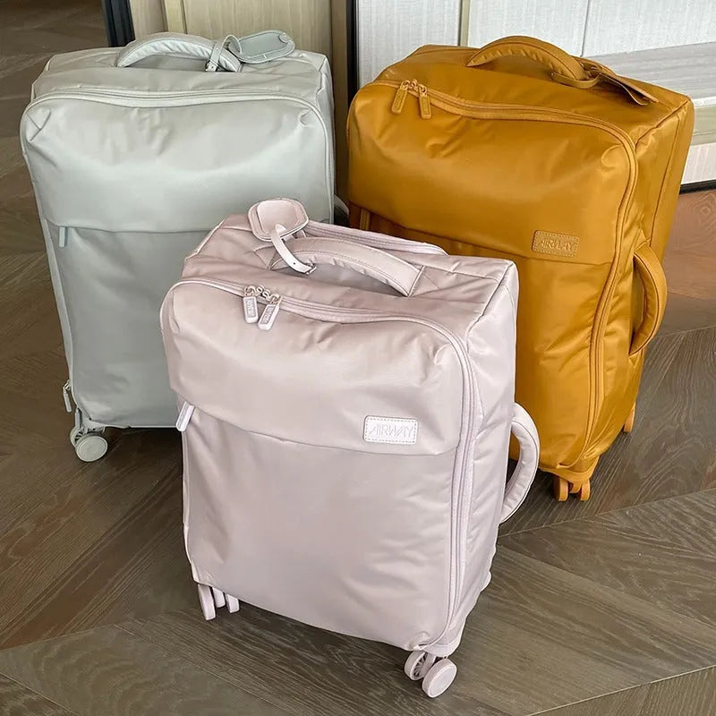 Ultra-light waterproof Oxford cloth suitcase in bluestone green with universal wheels and antimicrobial lining