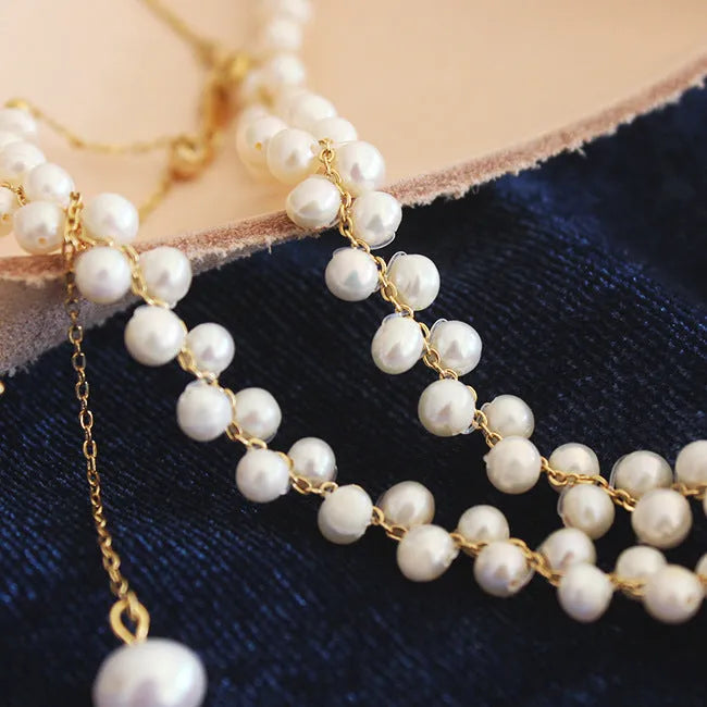 Hand-woven white pearl necklace with adjustable bean chain, 31-40cm circumference, 0.8cm wide.