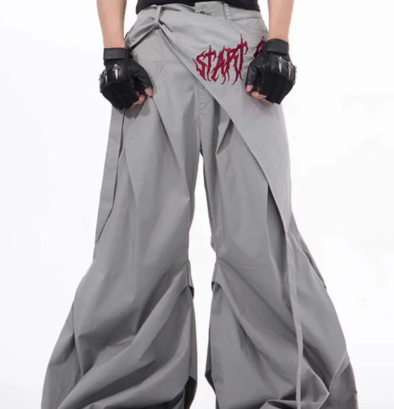 Boy modelling black wide-leg Korean-style summer trousers.