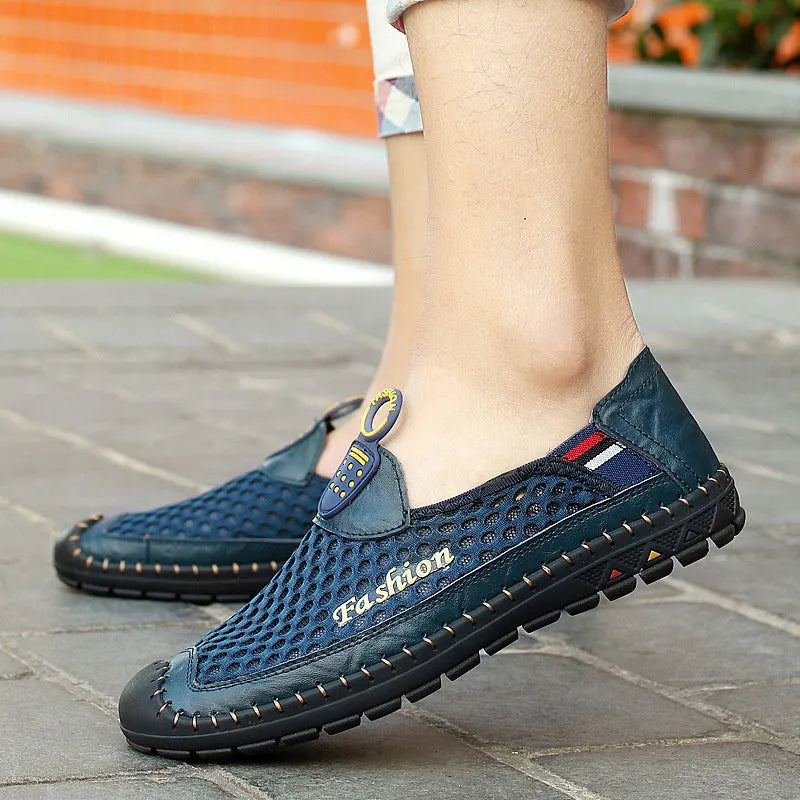 Men's brown mesh casual shoes with round toe and rubber soles on neutral background