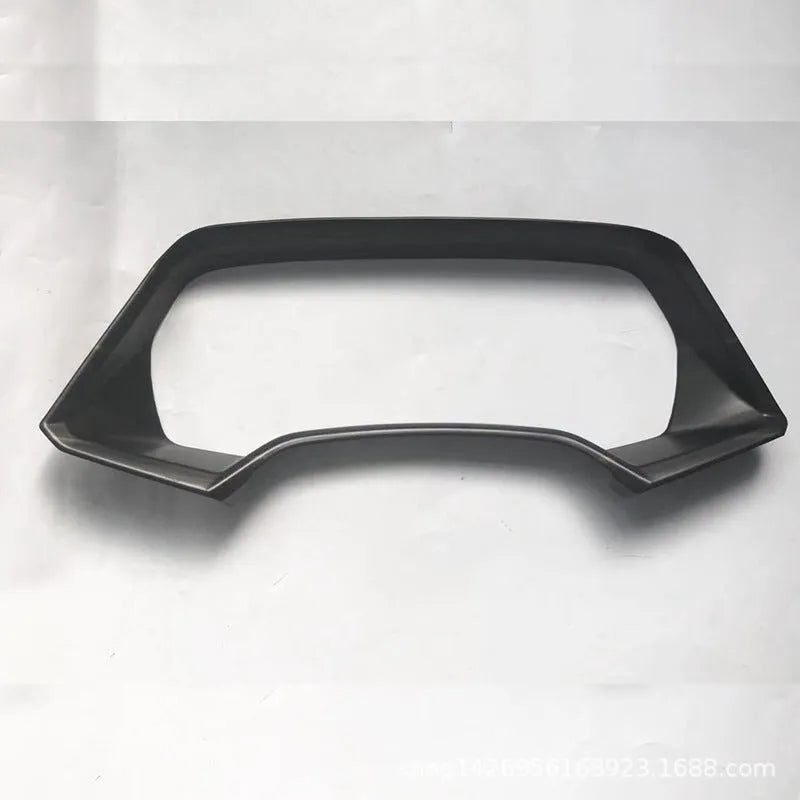 BMW X5 dashboard decorative frame in carbon fibre or peach wood finish
