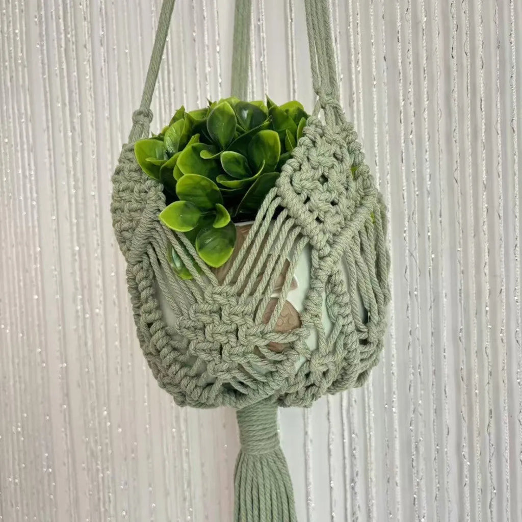 Hand-woven polyester cotton flower pot in brown with net pocket extension cord, approximately 30cm diameter.