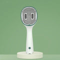Dark green UVC sterilisation pet grooming slicker brush with needle bristles for removing tangled cat and dog hair