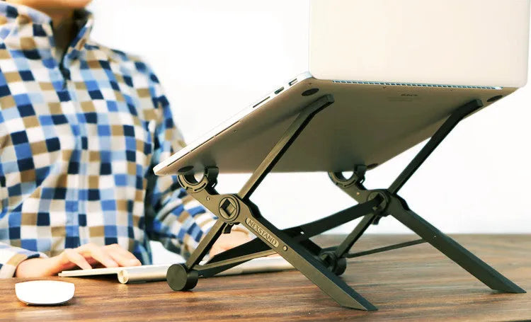Black folding portable laptop stand with reinforced nylon construction, shown in both extended and collapsed positions