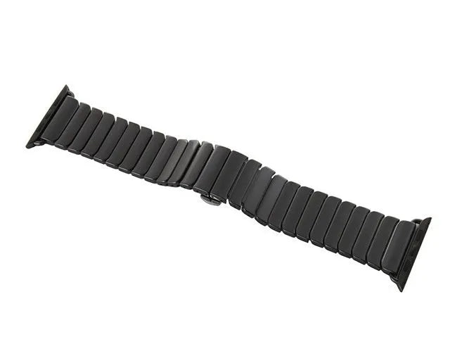 Black ceramic chain link Apple Watch strap with stainless steel clasp on a 42mm watch.
