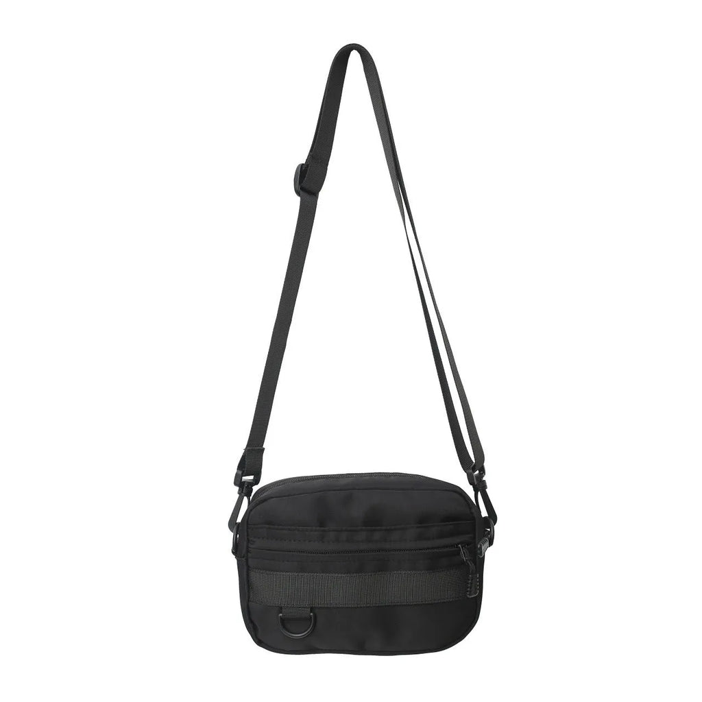 Men's solid colour nylon crossbody messenger bag with visible sewing thread detail.