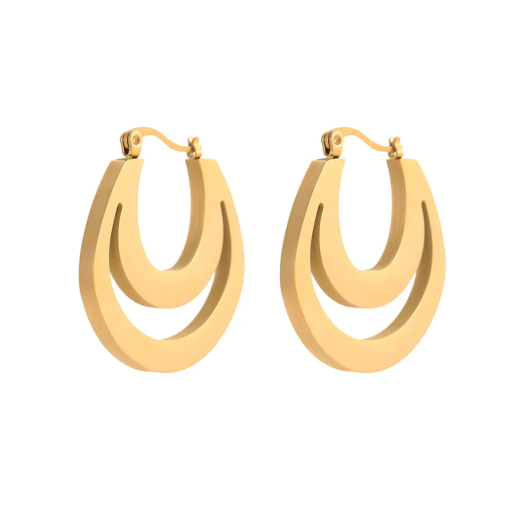 A pair of geometric minimalist French earrings in a round ring design, shown in both gold and steel metallic finishes.