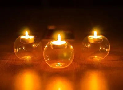 Handmade round hollow glass candle with spherical design, 7.5-10.0cm diameter range, clear transparent glass
