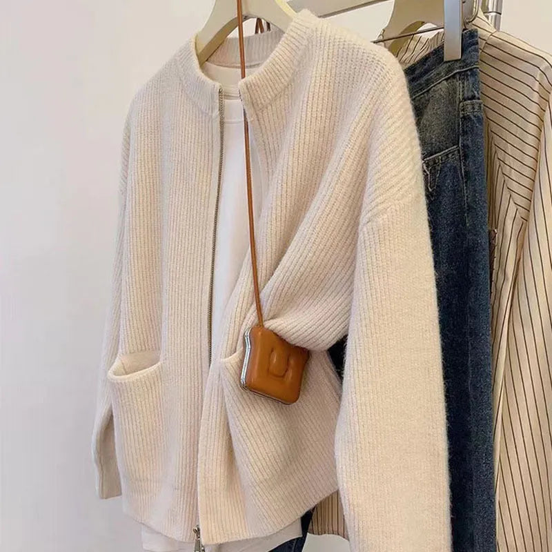 Beige viscose sweater coat cardigan with long sleeves showing soft texture and cardigan style