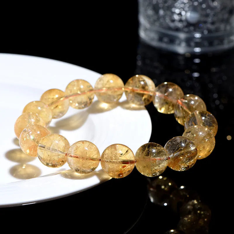 Natural yellow citrine bracelet with geometric beads in multiple size configurations from 4mm to 20.8mm diameters