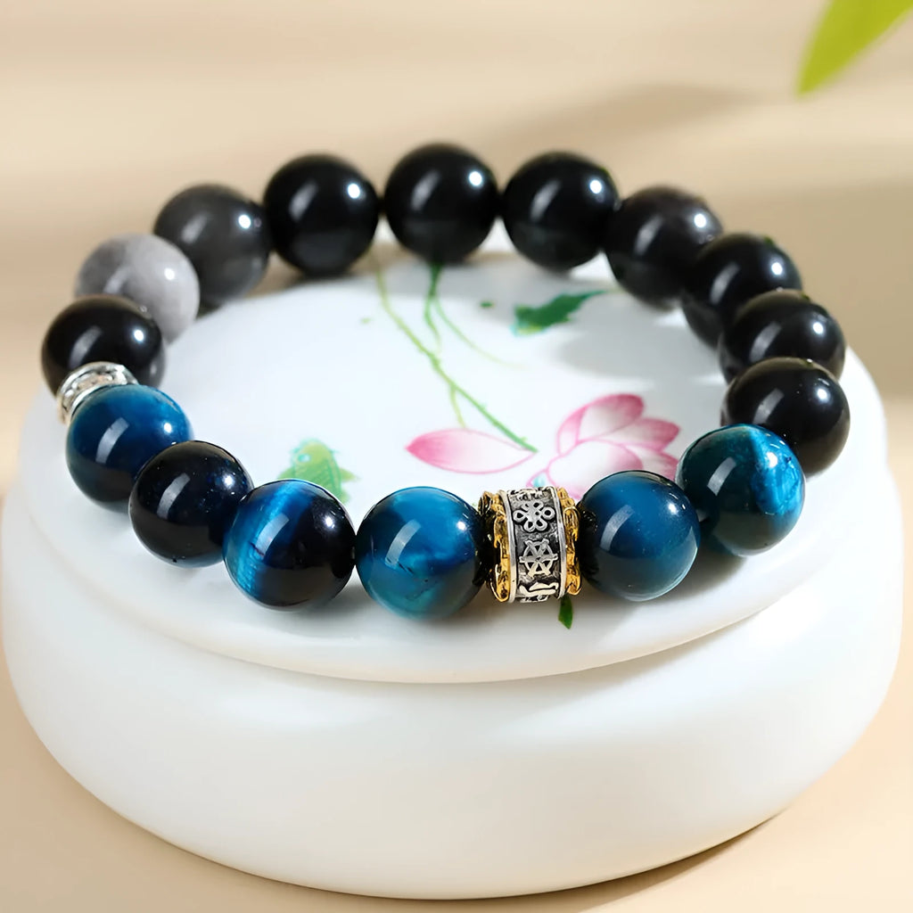 Handmade peacock blue Tigereye stone bracelet with geometric round design and adjustable wristband