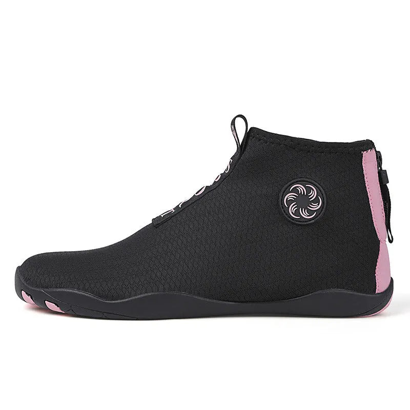 Outdoor beach shoes in black and fluorescent green with mesh upper and rubber sole.