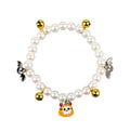 Halloween cat collar with simulated pearls and pumpkin designs in purple ghost, skull, and smiling motifs