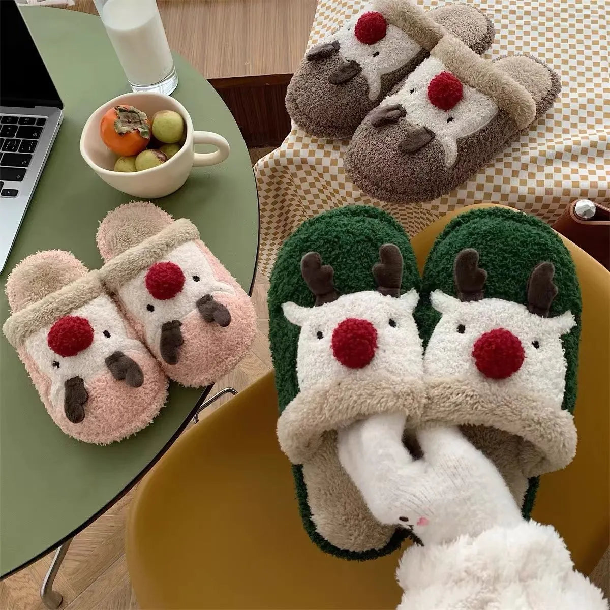 Women's green plush Christmas slippers with an elk design and a non-slip PVC sole.
