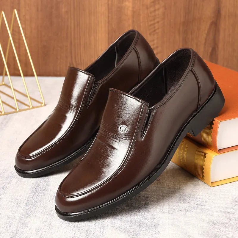 Men's black plus size casual shoe with a leather toe holder and rubber sole, shown from the side.