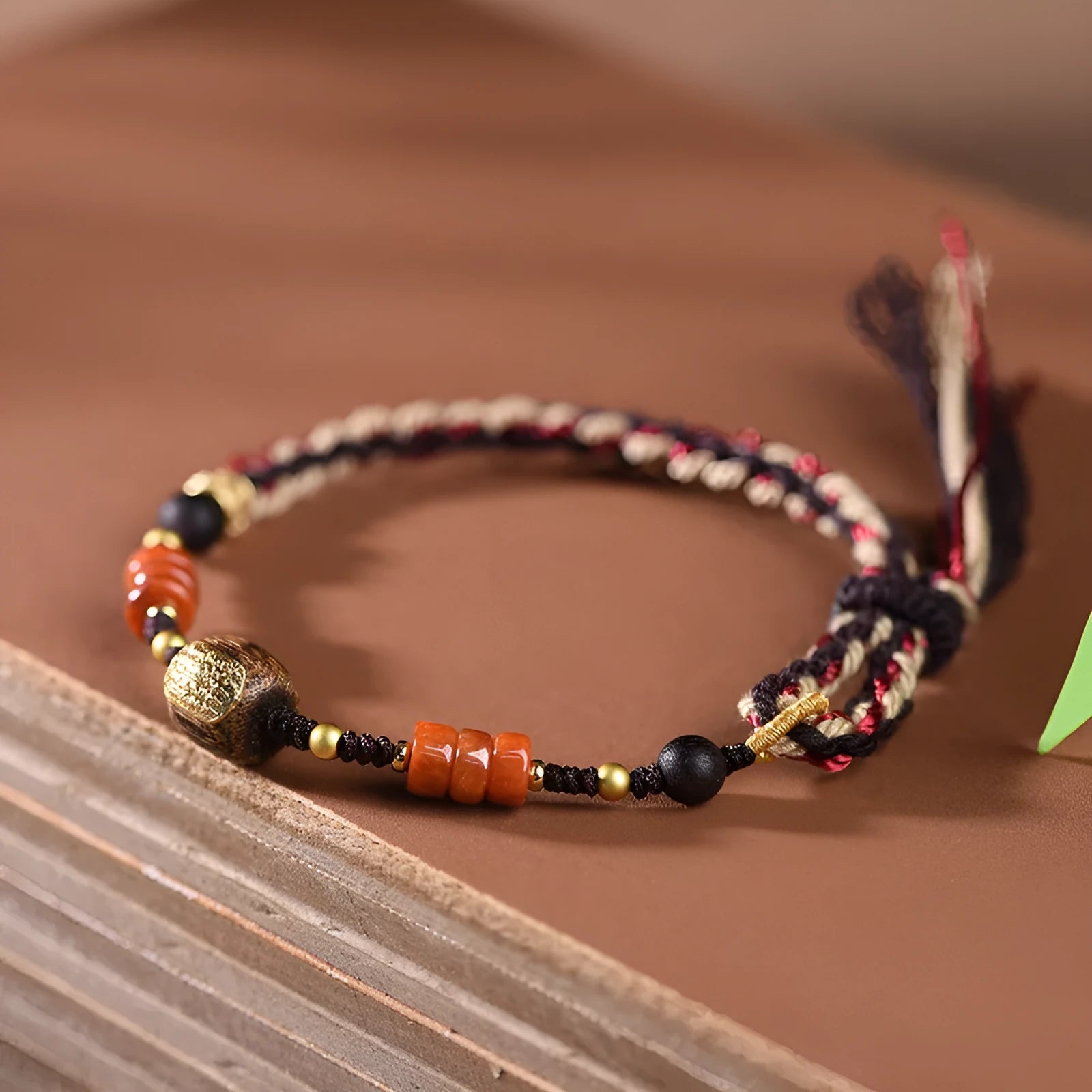 Hand-woven DIY watch band bracelet made from flexible wire in an ethnic lapis lazuli style.
