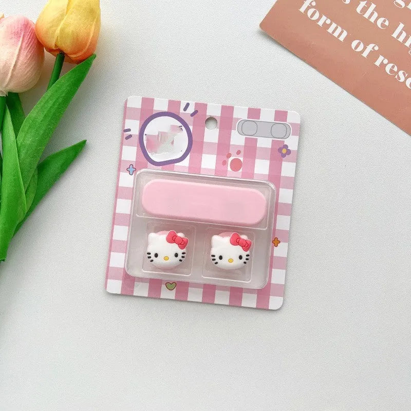 Cartoon-style magnetic plastic cable fixer clip in various colours on a metallic desk surface.