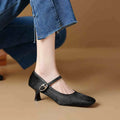 Women's black square toe stiletto ankle-strap shoes with horse hair upper and adjustable buckle closure