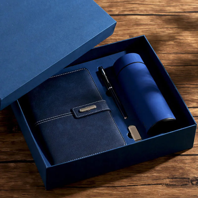A5 notebook with imitation leather cover in various colours, open to show wood-free paper pages