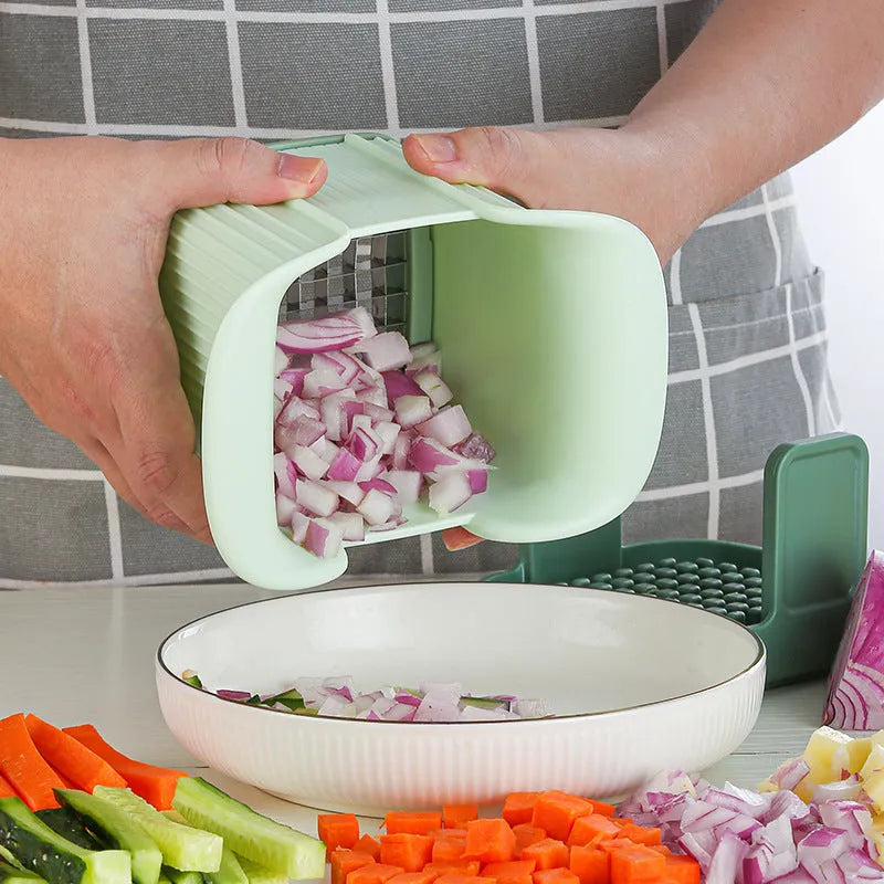 Green manual vegetable chopper with stainless steel blades for slicing onions, potatoes and cucumbers