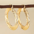 Geometric ring design ear clip earrings in copper with electroplated finish