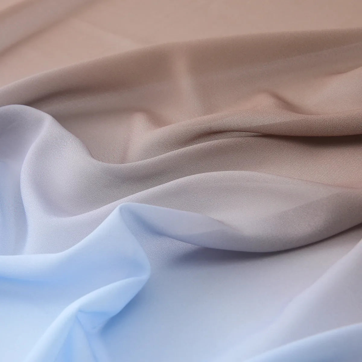 Extra-long chiffon summer scarf draped showing textured surface and multiple colour options