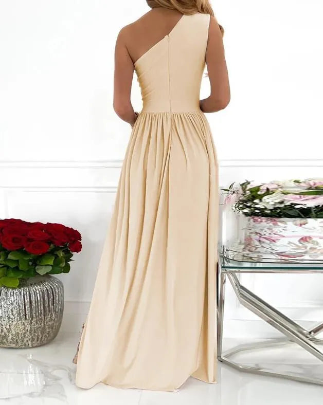 Women's one shoulder sleeveless maxi dress with high split and cutout detail in soft fabric.
